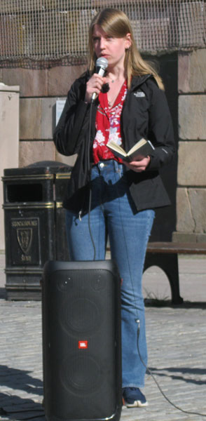 Baha'i participant reading a prayer